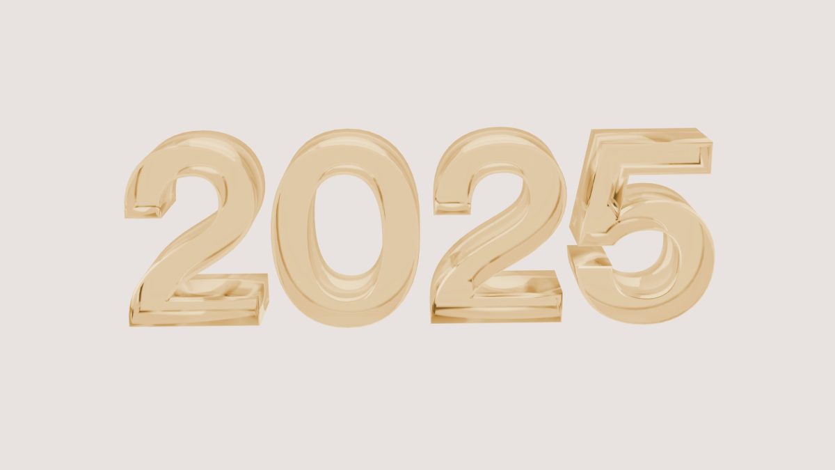 Gold three-dimensional numerals reading 2025 on a pale background